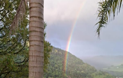 Rainbow Over House